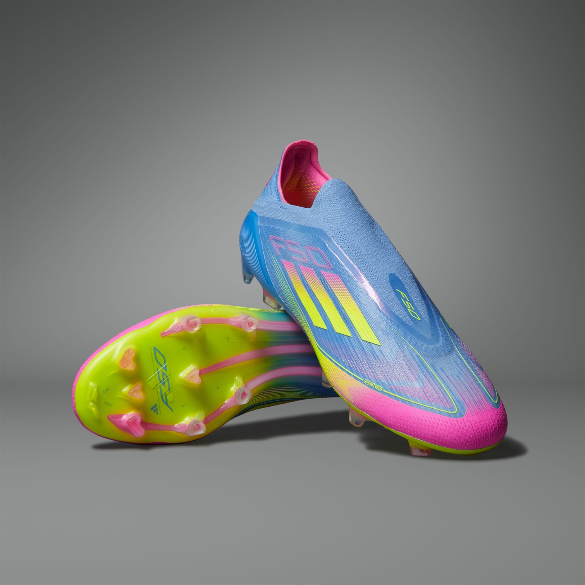 Botín de Fútbol F50 Elite Laceless FG Azul/Rosa